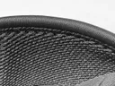 Close-up of the vest's breathable mesh padding around the watch pocket
